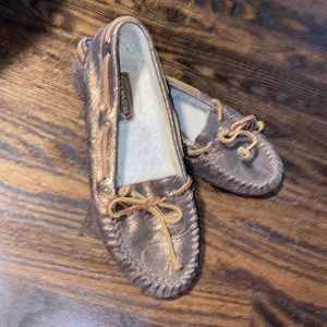 Coach moccasins.